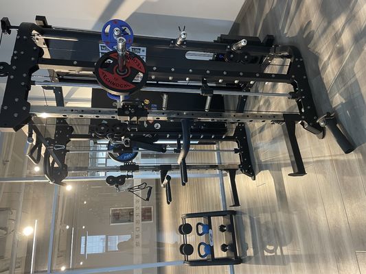 2023 Diseñado multifuncional gimnasio hogar máquina Smith para el entrenamiento de resistencia unisex