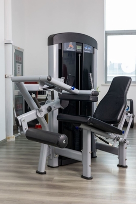 Aumenta tu viaje de culturismo con la máquina de extensión de piernas y rizos Hammer Strength
