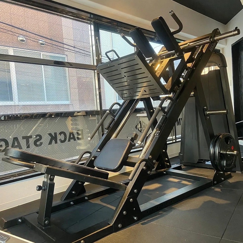 Durable Universal 2 en 1 Placa de doble función Prensa de piernas cargada Equipo de gimnasio de sentadillas