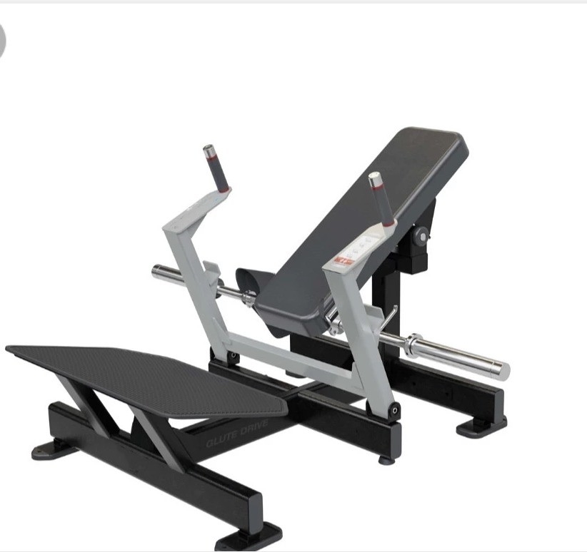 Máquina de empuje de cadera de barra con disco cargado de glúteos Una necesidad para el entrenamiento de fuerza