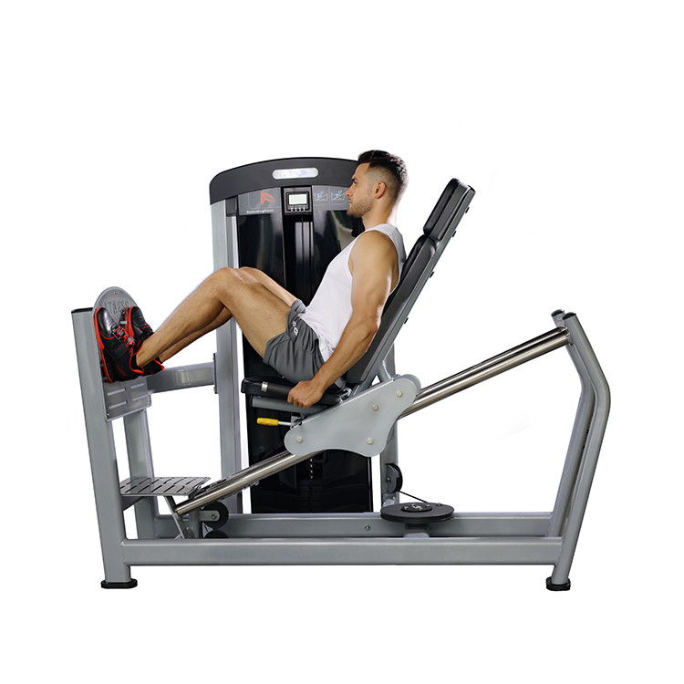 En el gimnasio en casa, la estación multiforma se pone en forma con nuestra máquina de prensado de piernas con estacas de peso.